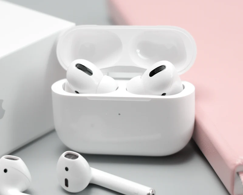 True wireless earbuds in their charging case