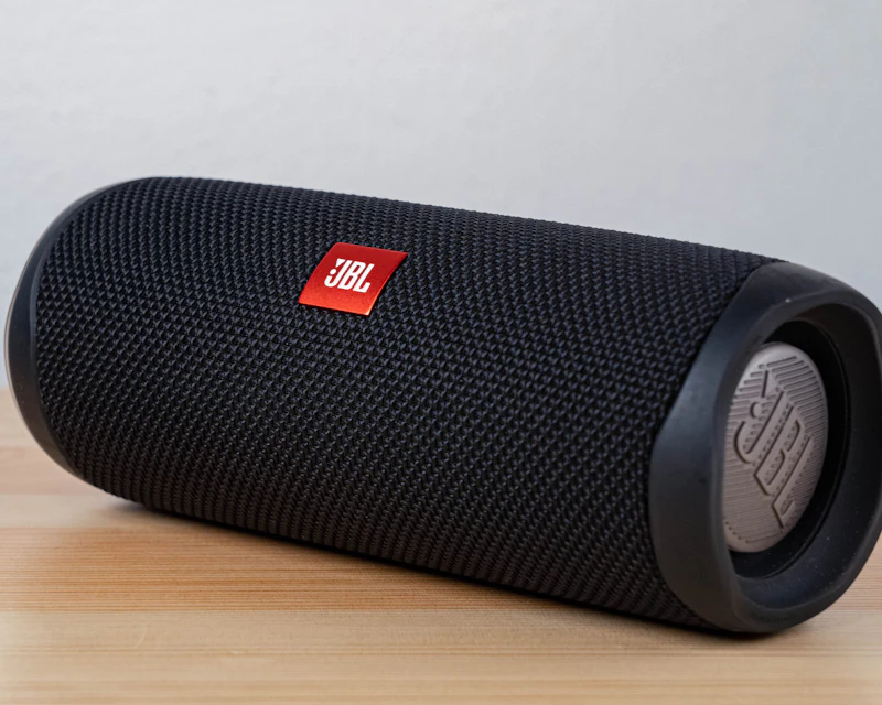 Portable Bluetooth speaker on a wooden table